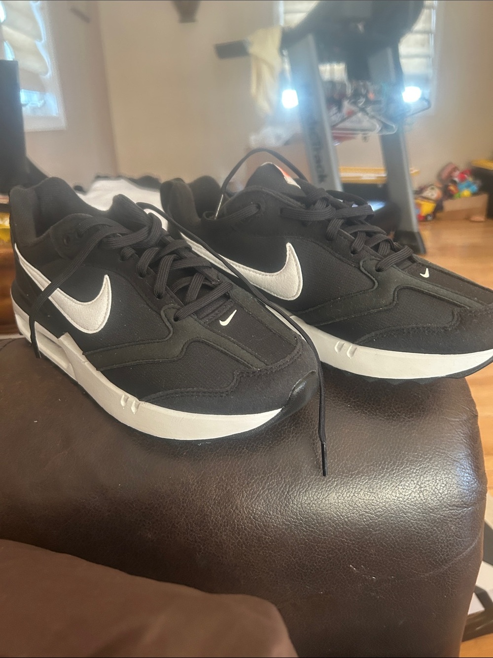 Nike Men’s Black Sneakers with White Swoosh